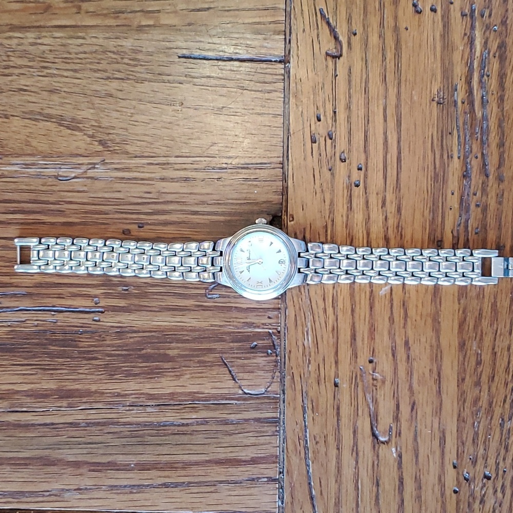 Eddie Bauer wrist watch sm classic bracelet 7 inches. Works. Has new battery